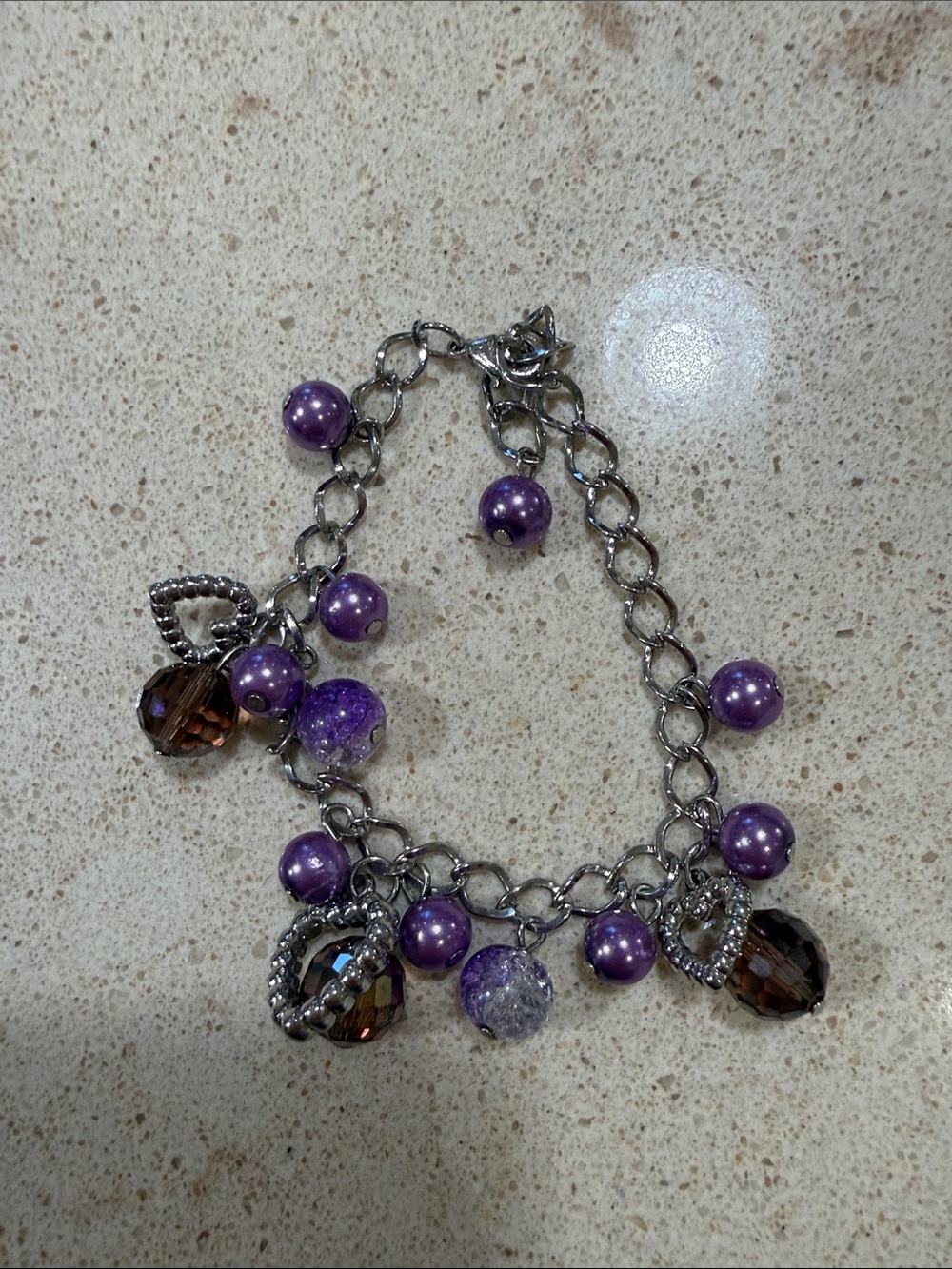 Silver Charm Bracelet with Purple Beads and Brown Crystal Accents